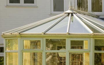 conservatory roof repair Commins Coch, Powys