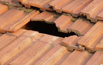 roof repair Commins Coch, Powys